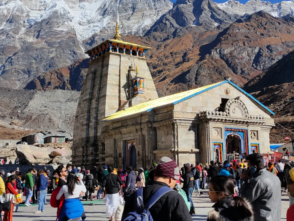 Kedarnath Temple stone structure surrounded by Himalayan mountains in Uttarakhand